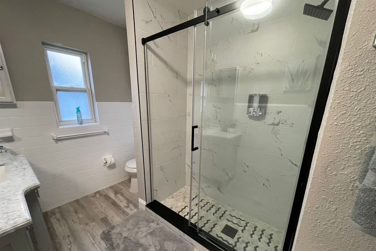 With its spacious enclosure and modern fixtures, you can indulge in a revitalizing shower at your leisure.