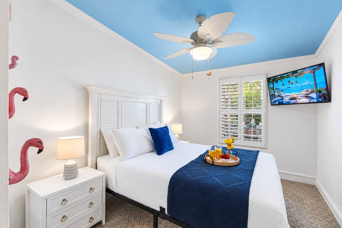 Enjoy cozy comfort with plush pillows, soft lighting, and a serene aesthetic throughout the room.