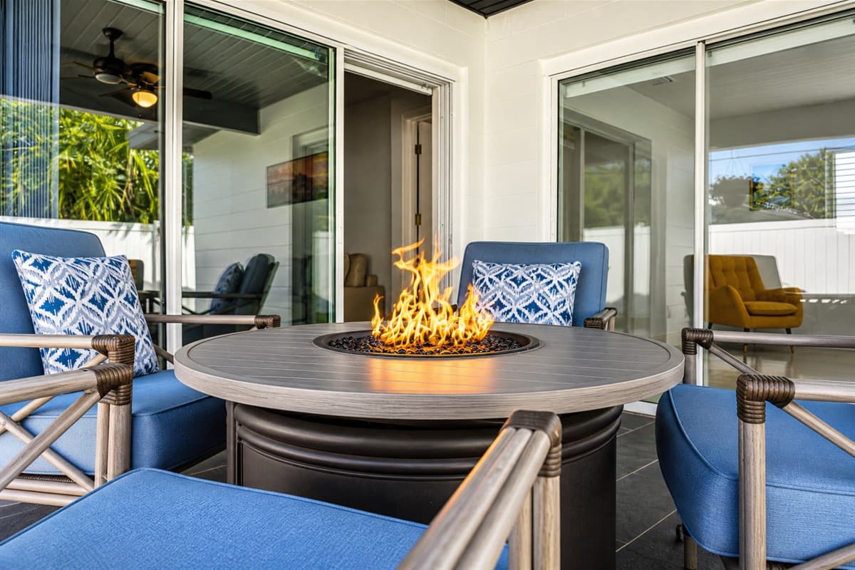 Cozy fire pit lounge area perfect for relaxing evenings and outdoor gatherings.