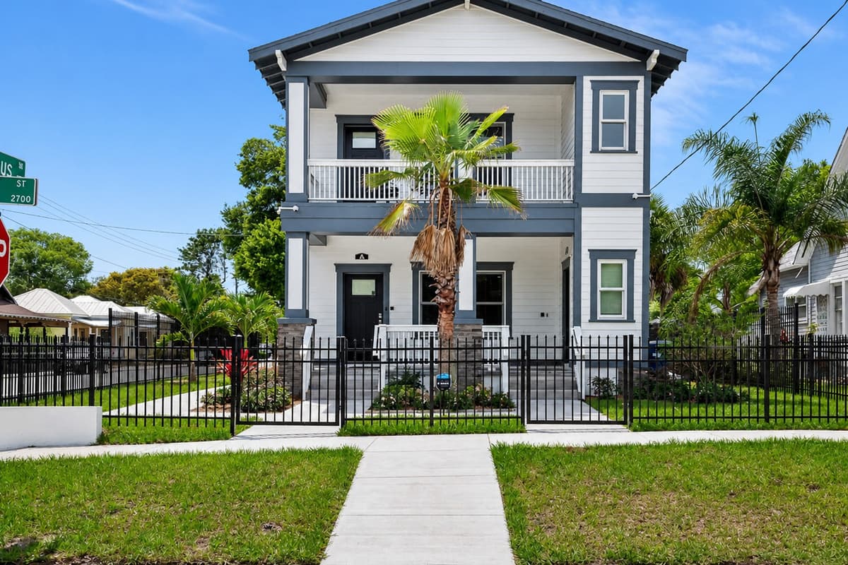 Stunning front view of the house showcasing the front yard and parking area that is equipped with CCTV cameras to ensure your safety during your stay. If you are interested in this property, send us an inquiry now!