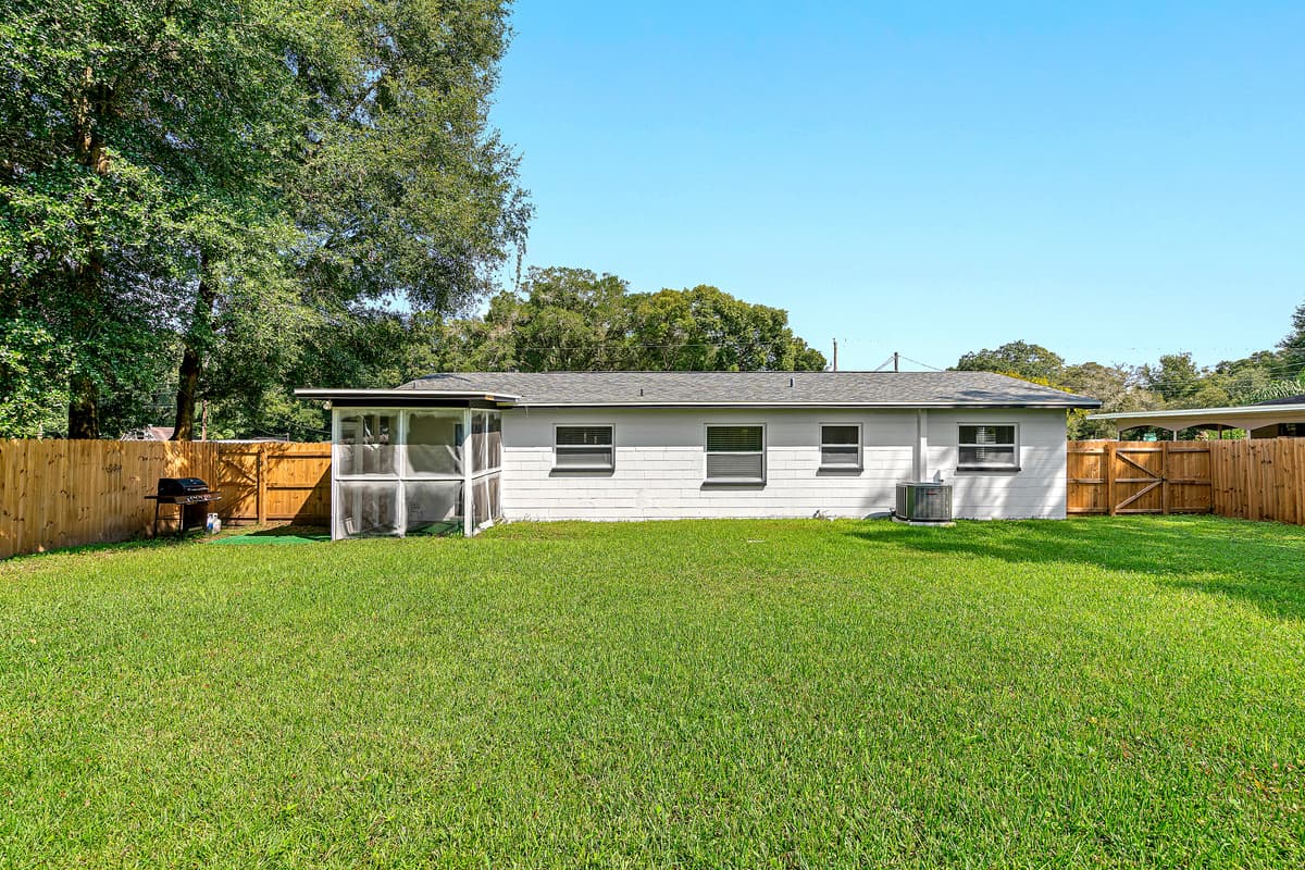 The beautiful fully fenced backyard where your family and friends can hang out! Have barbeque or grilled steak since we have a grill ready for you guys to use! Send us a message about this property now!