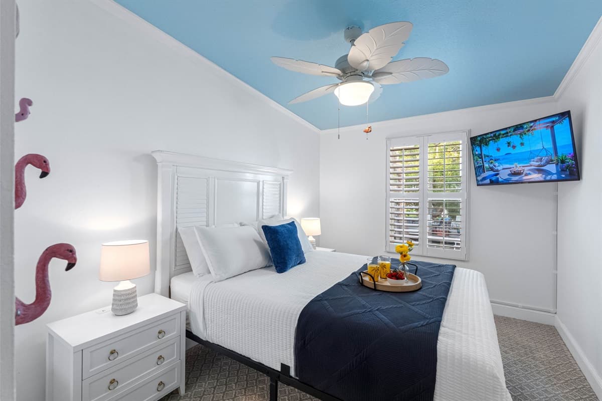 Enjoy cozy comfort with plush pillows, soft lighting, and a serene aesthetic throughout the room.