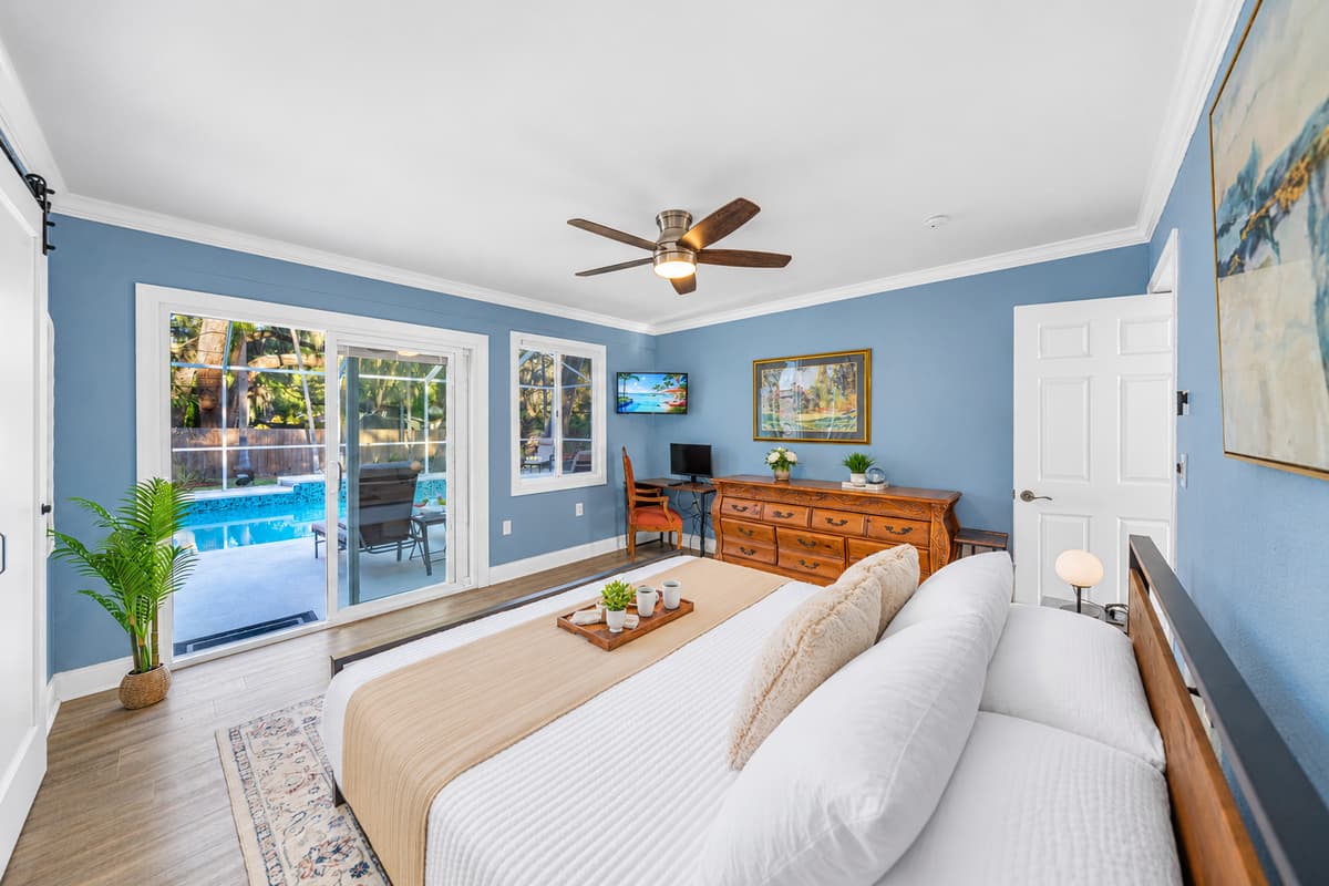 This king bedroom feels both elegant and welcoming, providing a tranquil space to rest and recharge.
