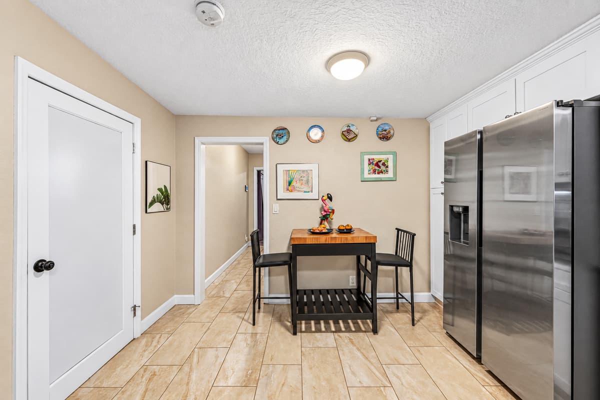 Cozy breakfast nook with seating for casual meals, coffee, or quick bites.