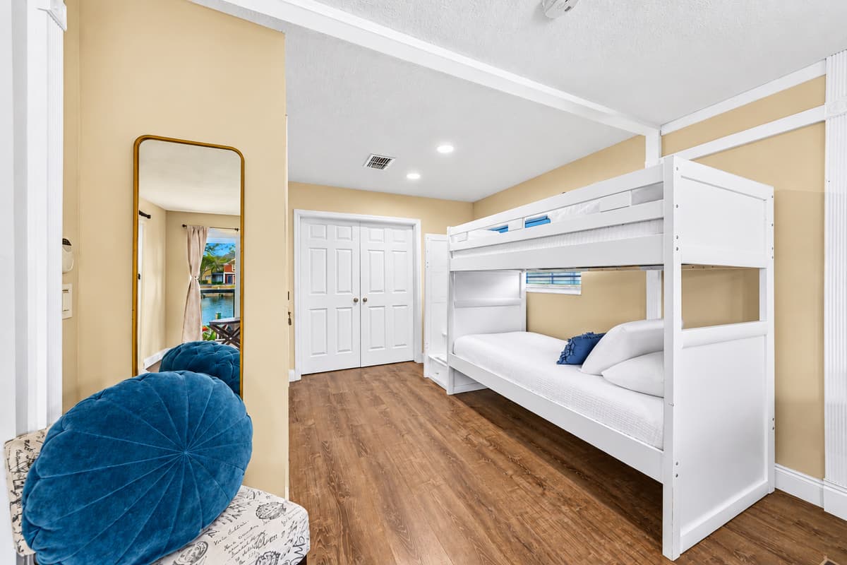 Spacious sleeping area with bunk beds, modern furnishings, and plenty of room to unwind.