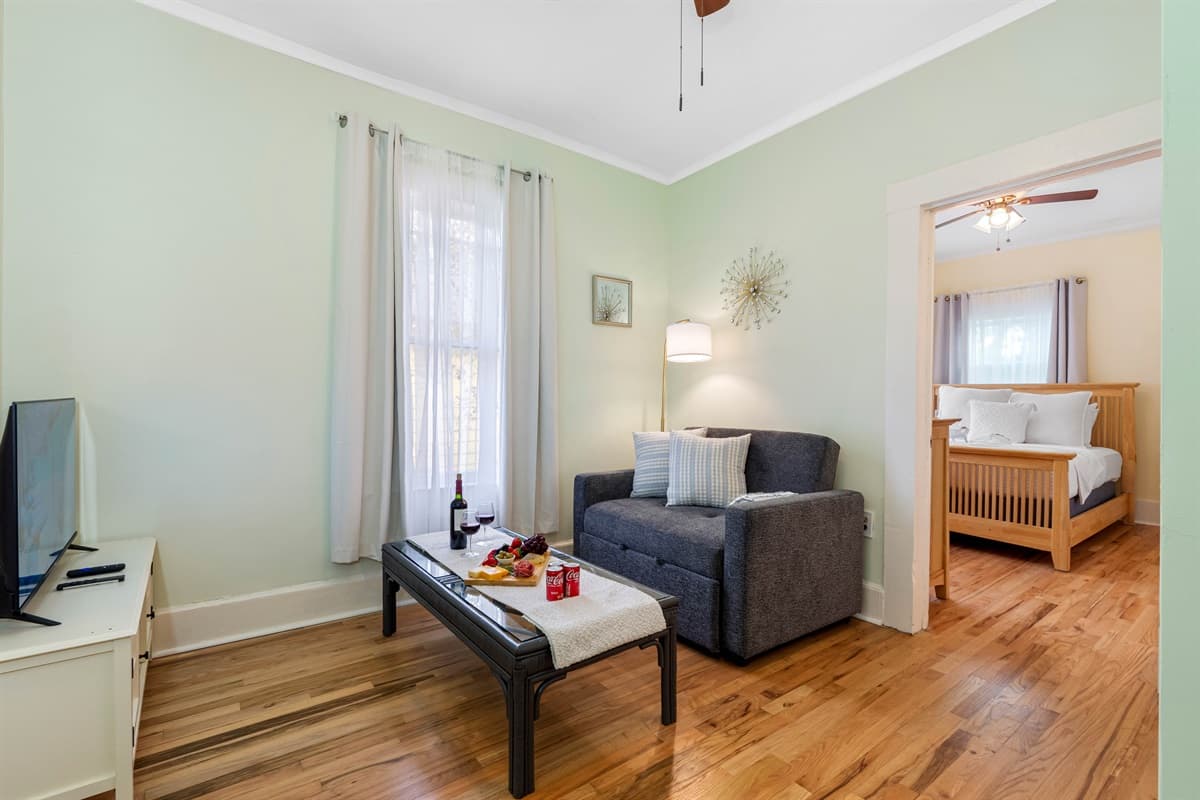 For added convenience and comfort, the property features a thoughtfully designed cozy sitting/common area that connects both bedrooms.