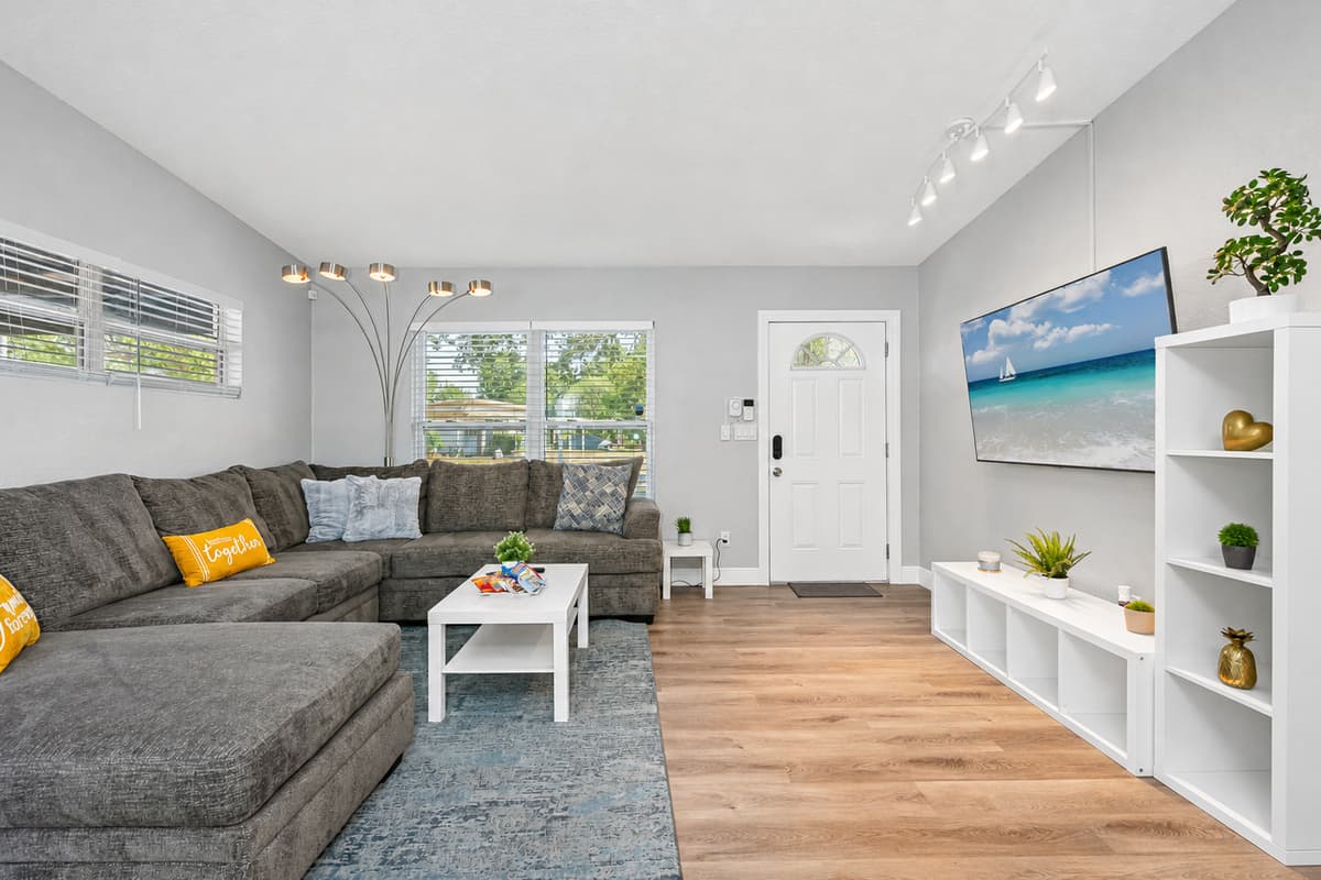 . The wooden floor adds warmth and character to the room, giving it a classic and timeless look.
