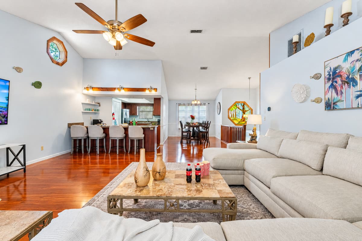 The star of the room is the light cream L-shaped sectional, spacious enough to stretch out solo or gather the whole group for a movie night.