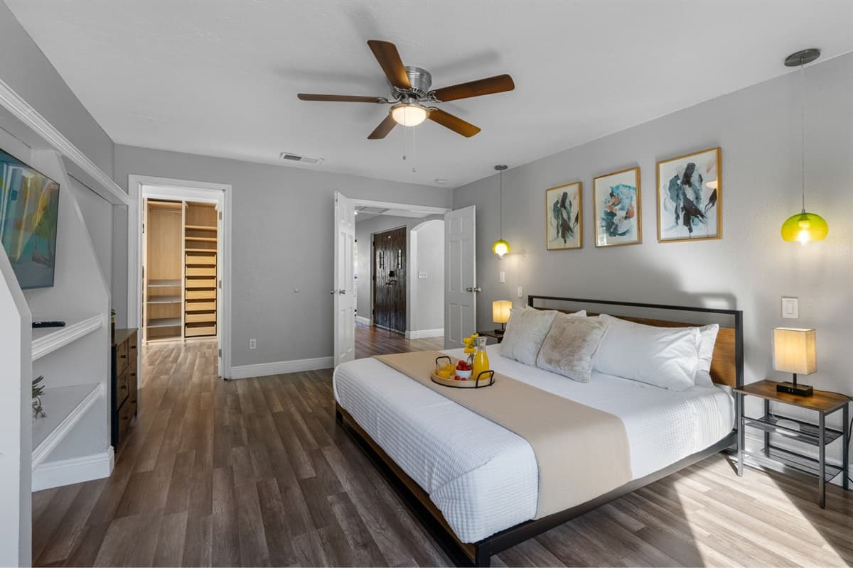 Relax in this bright master suite featuring a king-size bed, ensuite bath, and modern comforts.