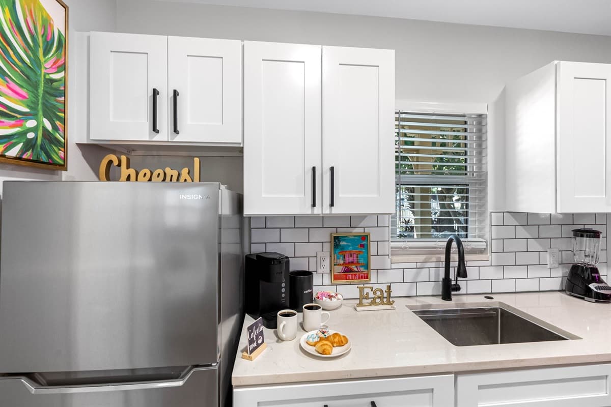 From the high-end fixtures and finishes to the ergonomic layout, which ensures that everything you need is within arm's reach, this kitchen is designed to inspire your inner chef.