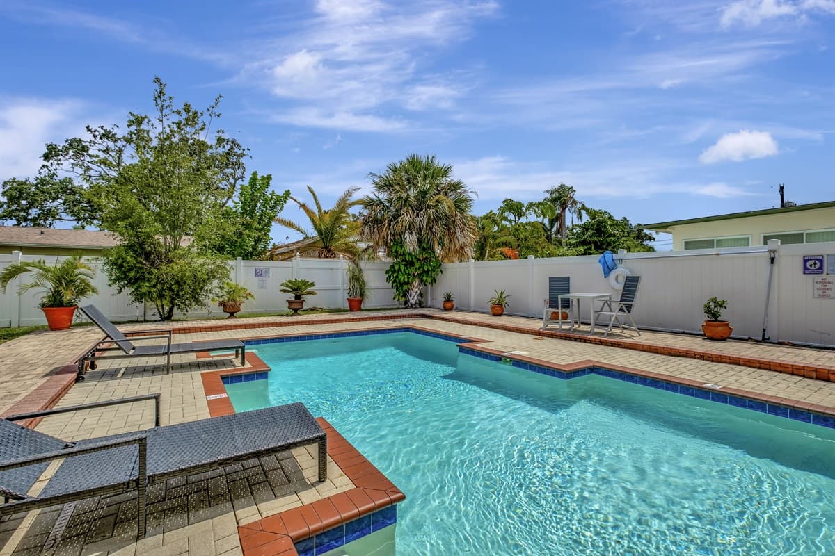 Immaculate heated salt pool with beautiful plants and fully fenced backyard. Perfect for families with kids to safely play in the area without worrying for their safety. 