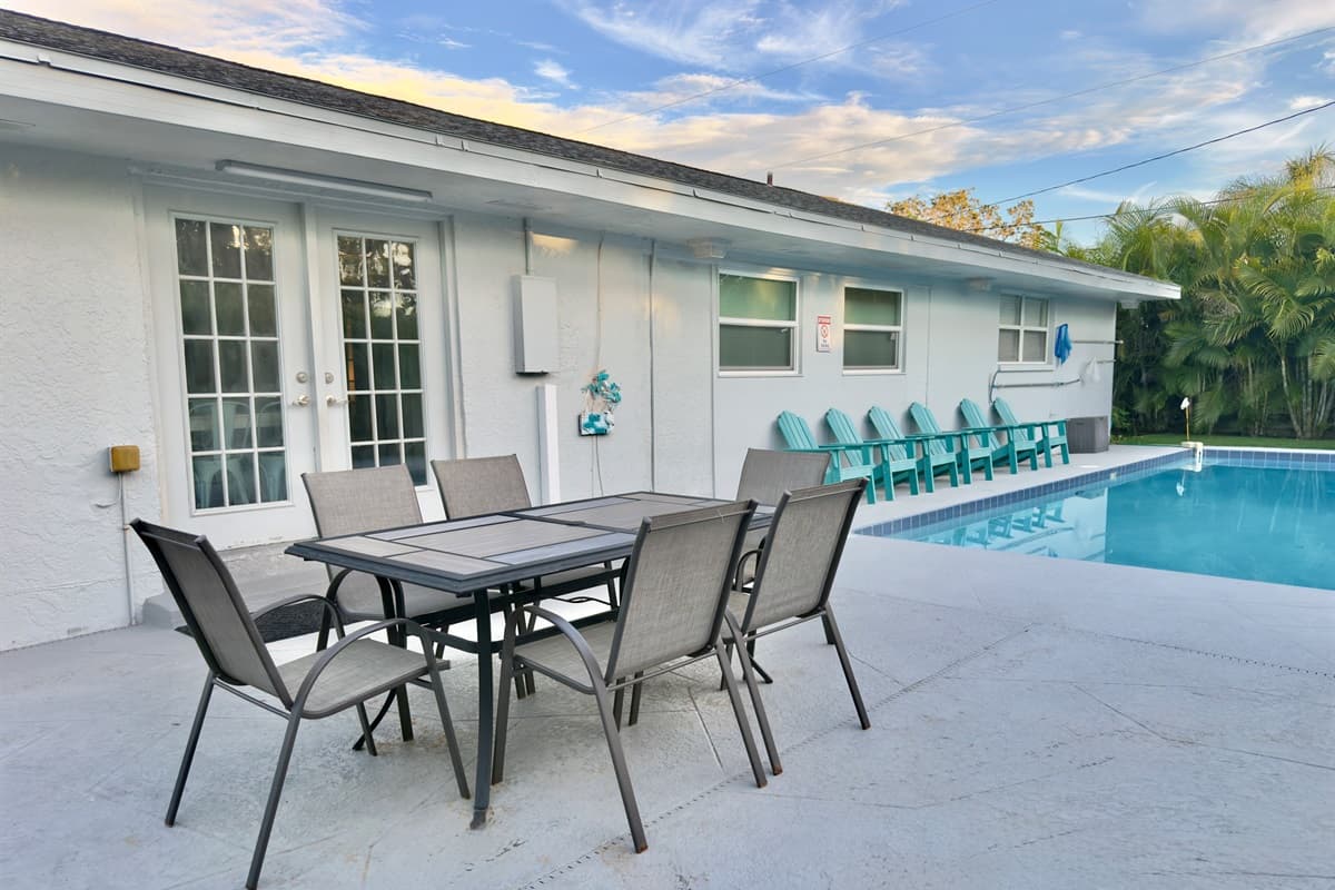 Relax poolside with comfortable lounge chairs, perfect for sunbathing or unwinding after a day of adventure.