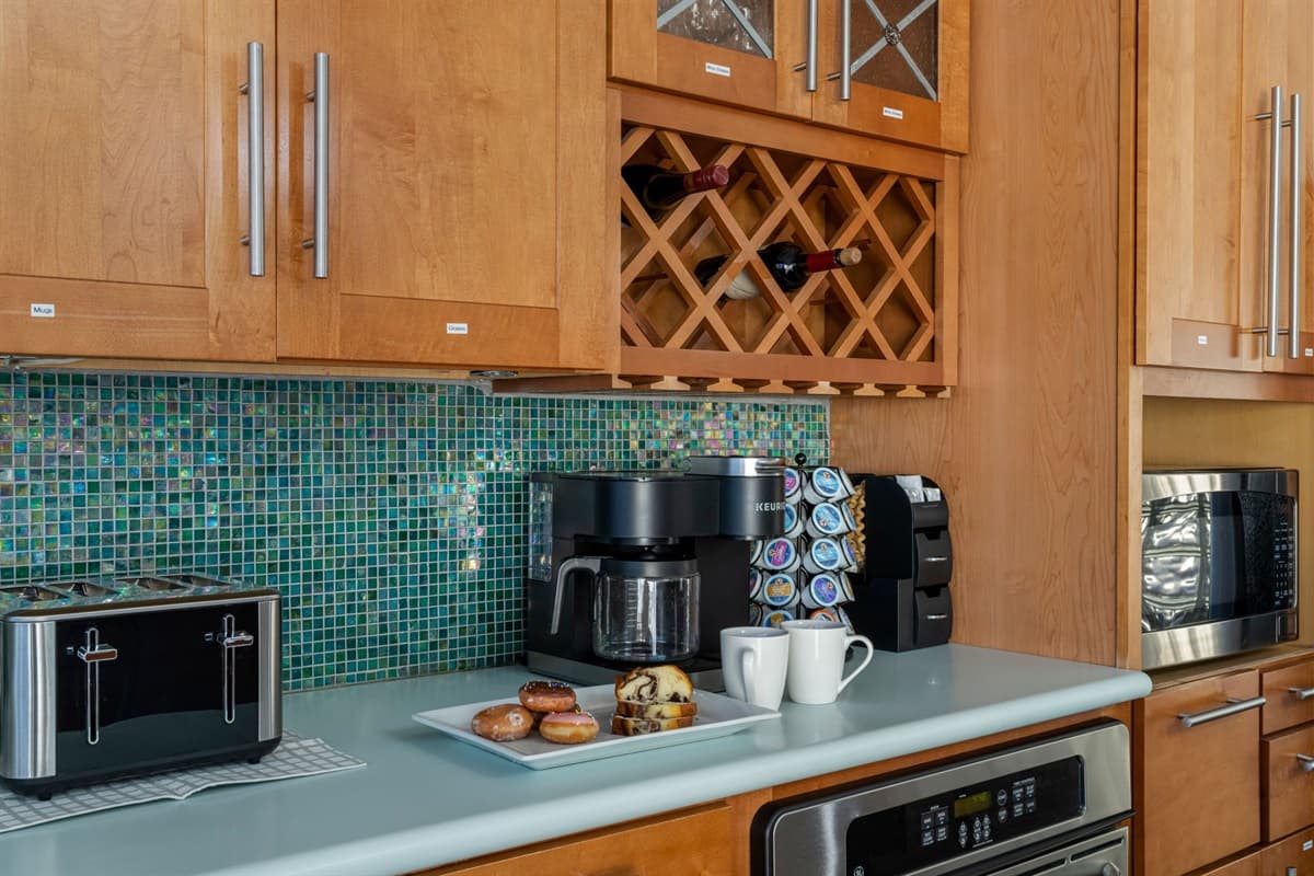 Start your day with coffee from the fully stocked coffee bar and enjoy the morning sun streaming in.
