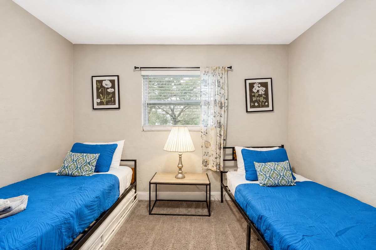 As natural light cascades through the windows, the room comes alive, inviting you to unwind and bask in the allure of this intimate space.