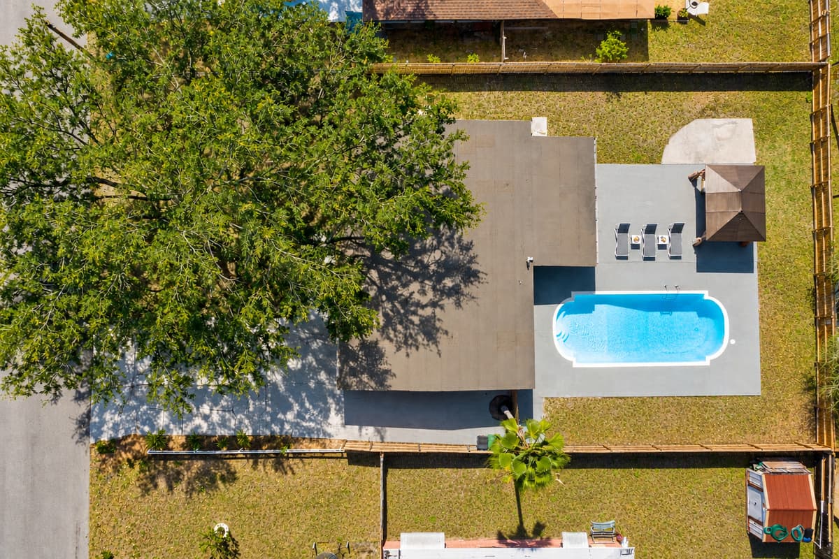 Get ready for a bird's eye view of paradise! Our stunning house and pool are the stars of the show from above