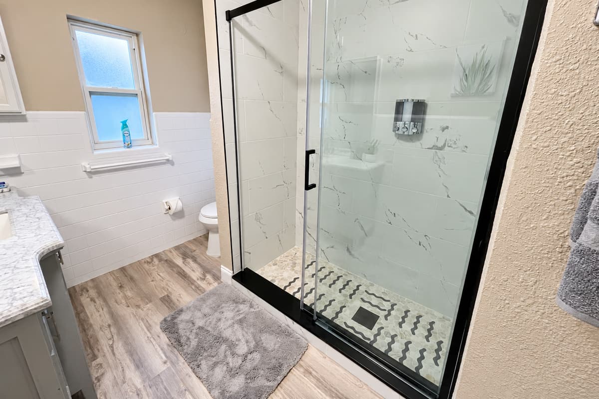 With its spacious enclosure and modern fixtures, you can indulge in a revitalizing shower at your leisure.